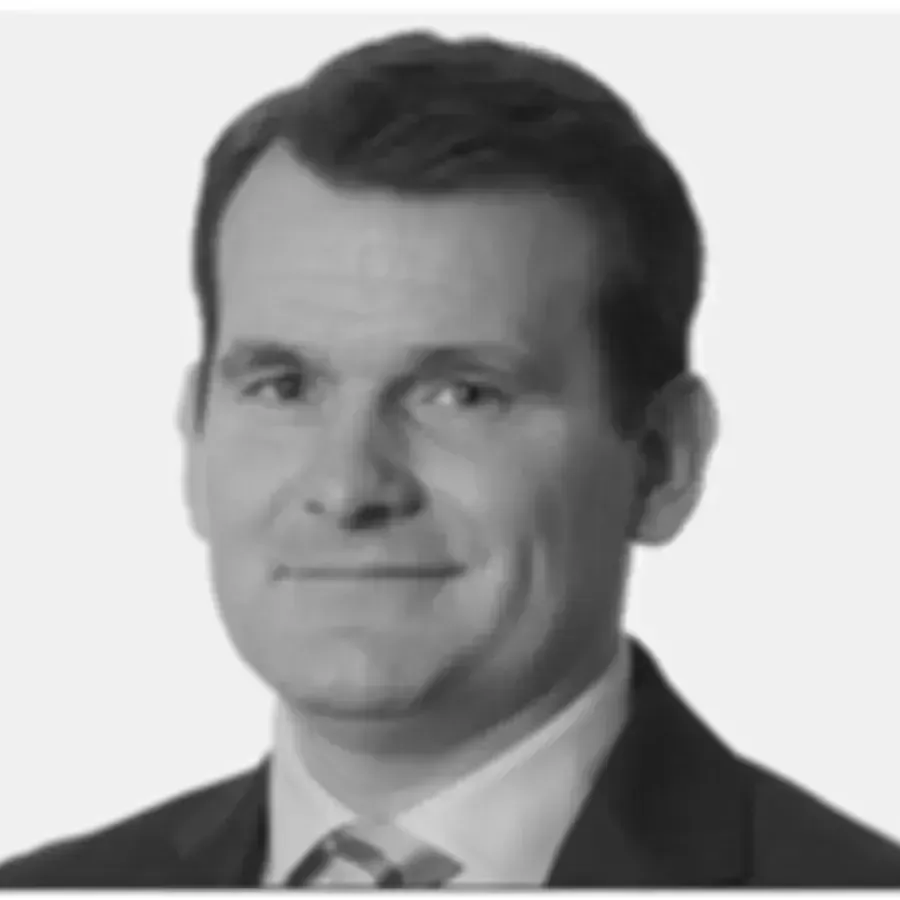 Black and white headshot of a man