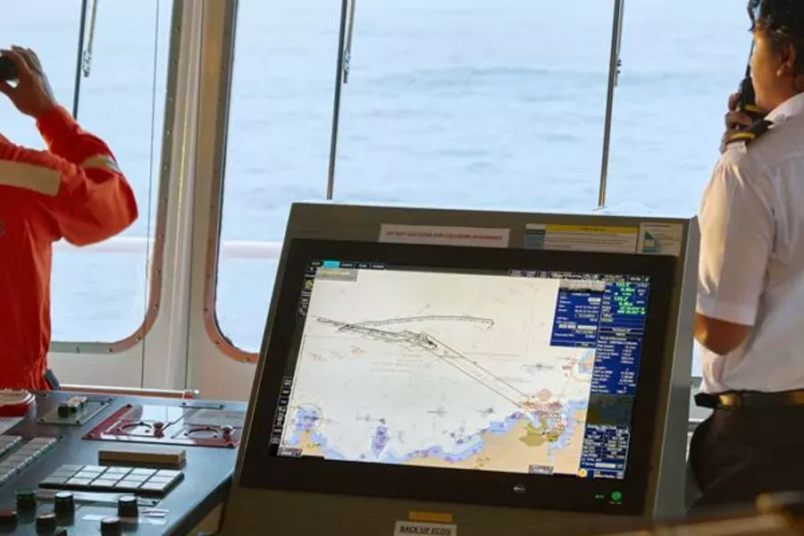 Two mariners on the bridge of a ship