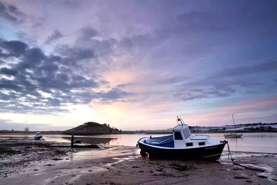 Boats on coastline