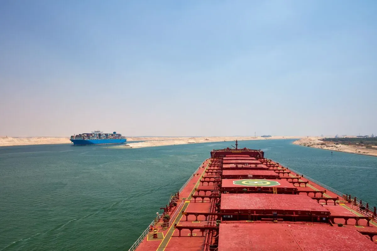 Southbound bulk and northbound container ship Suez.